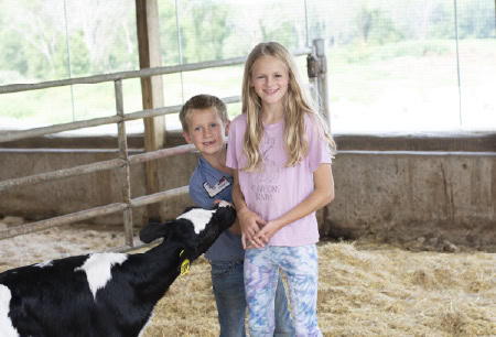 Fresh milk from Burnett Dairy Cooperative showcased in PATRIA's foodservice offerings, emphasizing high-quality dairy products.